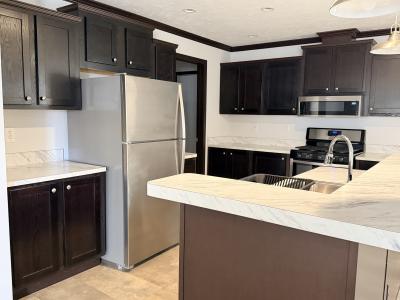 Photo 3 of 5 of home located at 107 Burr Oak Drive Coopersville, MI 49404