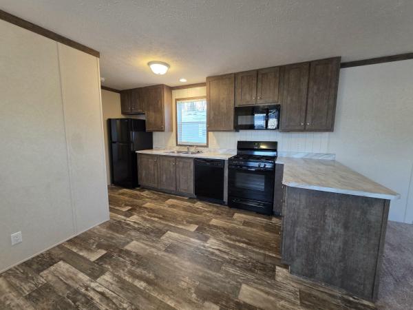 Photo 1 of 2 of home located at 1267 Avenue A #164 Springfield, MI 49037