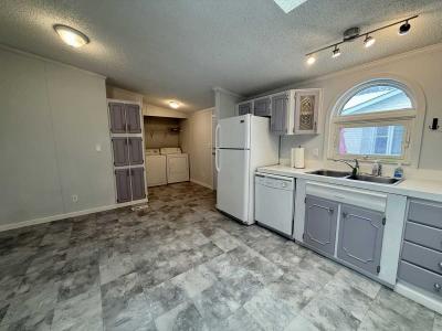 Photo 3 of 8 of home located at 7104 Scarborough Ln Whitemore Lake, MI 48189