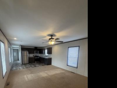 Photo 3 of 10 of home located at 836 Riverbend Lane Site 052 Middleville, MI 49333