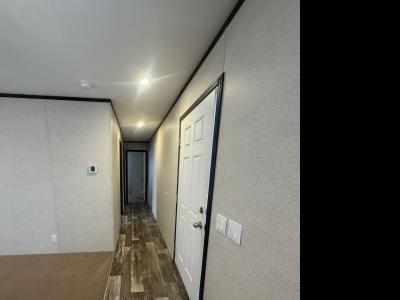 Photo 4 of 10 of home located at 836 Riverbend Lane Site 052 Middleville, MI 49333