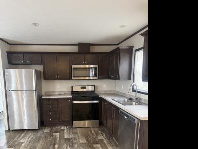 Photo 5 of 10 of home located at 836 Riverbend Lane Site 052 Middleville, MI 49333