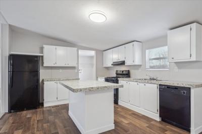 Photo 2 of 15 of home located at 1500 W Thornton Pkwy Lot 11 Thornton, CO 80260