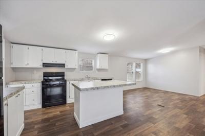 Photo 3 of 15 of home located at 1500 W Thornton Pkwy Lot 11 Thornton, CO 80260