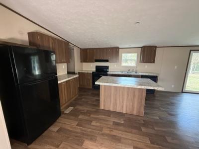 Photo 4 of 14 of home located at 12610 County Road 3740 Cleveland, TX 77327