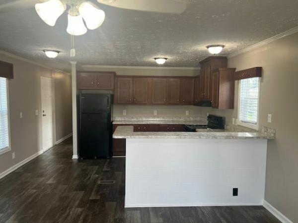 Photo 1 of 2 of home located at 724 Creek Ridge Road #64 Greensboro, NC 27406