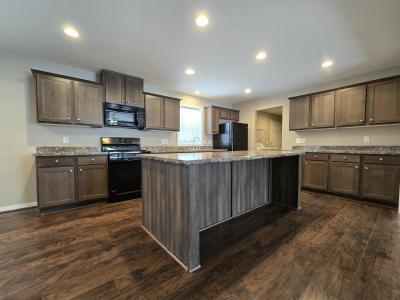 Photo 3 of 13 of home located at 7204 East Grand River Ave Lot 250 Portland, MI 48875