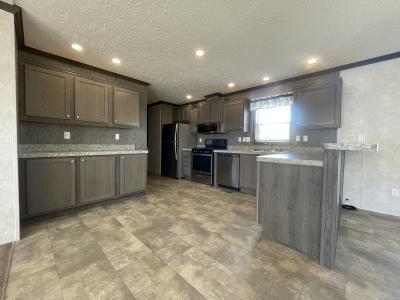 Photo 3 of 12 of home located at 7204 East Grand River Ave Lot 373 Portland, MI 48875