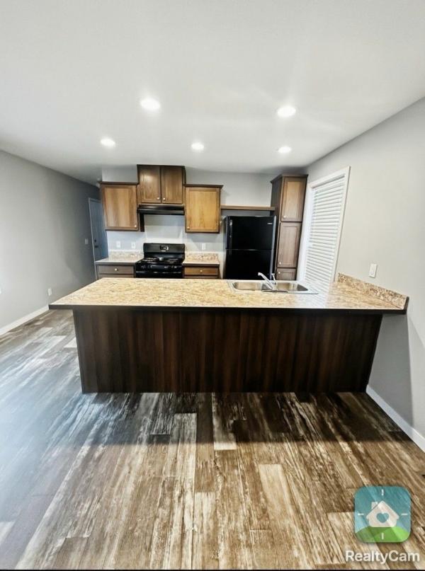 Photo 1 of 2 of home located at 13318 S. Dixie Hwy. # 127 Holly, MI 48442