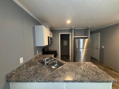 Photo 3 of 25 of home located at 831 N. Pontiac Trail, #64 #64 Walled Lake, MI 48390