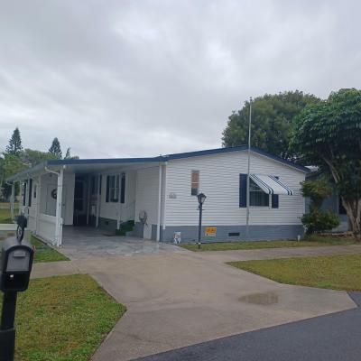 Photo 1 of 12 of home located at 6582 NW 34th Ave Coconut Creek, FL 33073