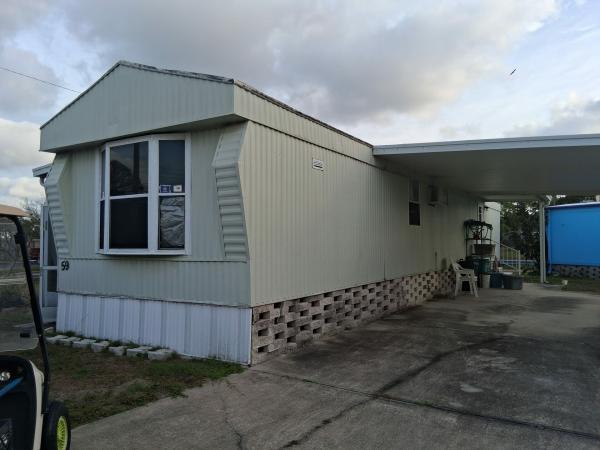 Photo 1 of 2 of home located at 7403 46th Ave. N. Lot 59 Saint Petersburg, FL 33709