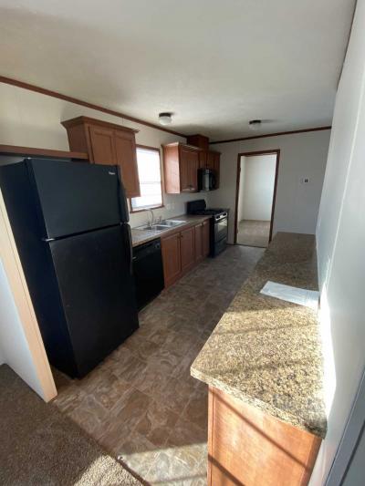 Photo 4 of 16 of home located at 4038 Clement St Milford, MI 48381