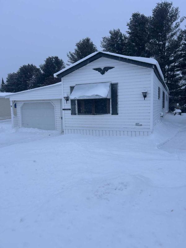 Photo 1 of 1 of home located at W8007 S Us Hwy 2/141 Iron Mountain, MI 49801