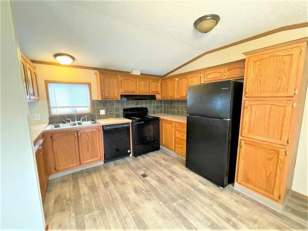 Photo 1 of 2 of home located at 45646 Nichole Dr., Site #90 Macomb, MI 48044
