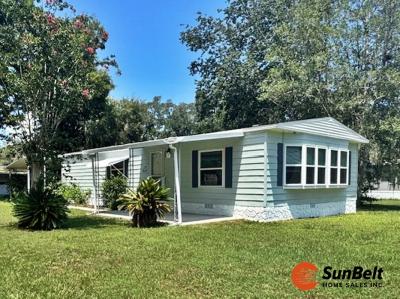 Photo 2 of 56 of home located at 3021 SW 88th Street Ocala, FL 34470