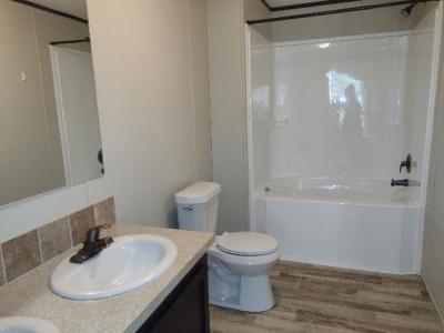 Photo 4 of 5 of home located at 1204 Briar Downs Lot 39 Burton, MI 48529