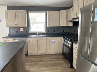 Photo 3 of 9 of home located at 215 South Lyon Woods South Lyon, MI 48178