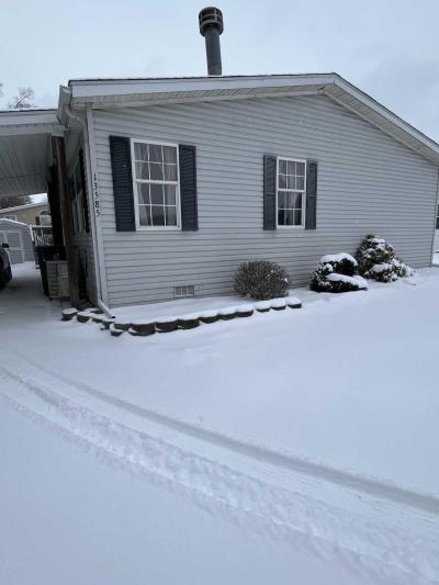 Photo 2 of 12 of home located at 13585 Albany Court Hartland, MI 48353