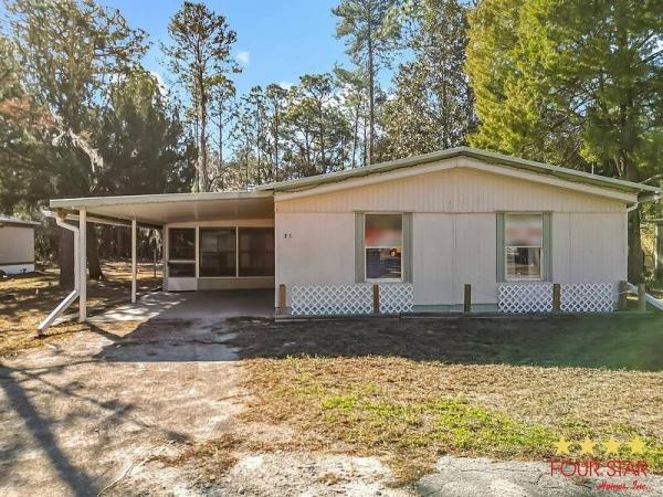 Photo 1 of 2 of home located at 14051 SE Highway 19 Inglis, FL 34449