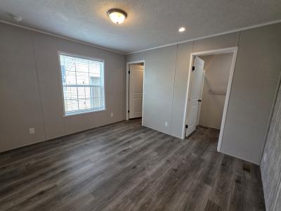 Photo 4 of 7 of home located at 272 W Glengarry Ct Highland, MI 48357