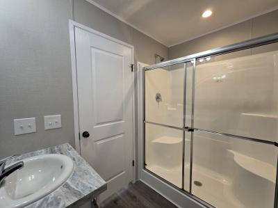 Photo 5 of 7 of home located at 272 W Glengarry Ct Highland, MI 48357