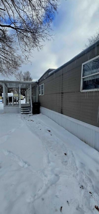 Photo 2 of 19 of home located at 302 Brittany Drive #210 Lansing, MI 48906