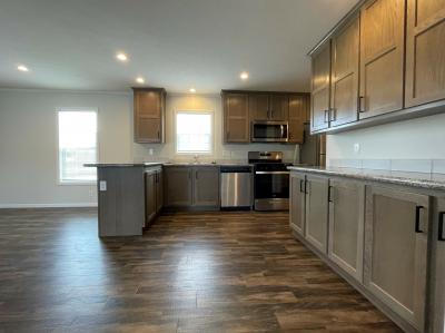 Photo 3 of 9 of home located at 7204 East Grand River Ave Lot 477 Portland, MI 48875