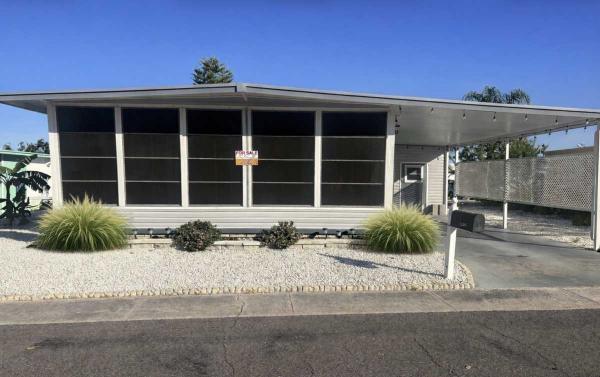 Photo 1 of 2 of home located at 1100 Curlew Road Lot 58 Dunedin, FL 34698