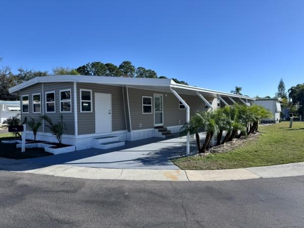 Photo 1 of 2 of home located at 1100 Curlew Rd Lot 198 Dunedin, FL 34698