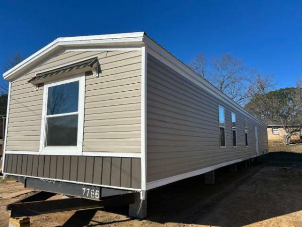 Photo 1 of 2 of home located at Mid Miss Homes & Transport Inc 906 B North Jackson Kosciusko, MS 39090