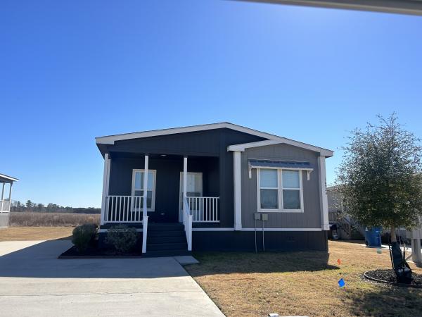 Photo 1 of 2 of home located at 10926 E Xavier St Conroe, TX 77303