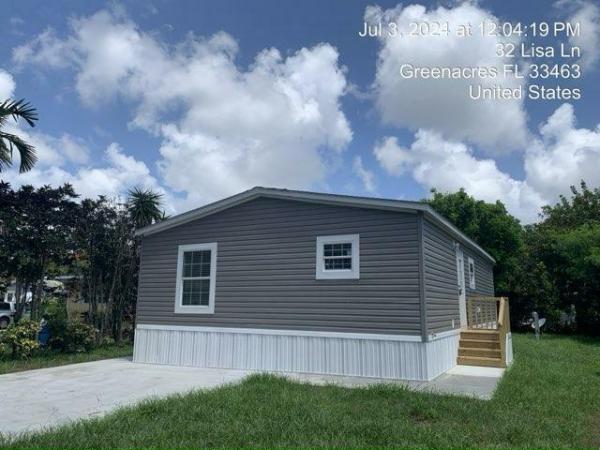 Photo 1 of 2 of home located at 31 Lisa Lane Greenacres, FL 33463