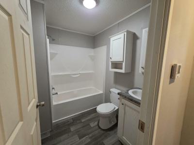 Photo 5 of 7 of home located at 1301 Avenue A, Unit 24 Springfield, MI 49037