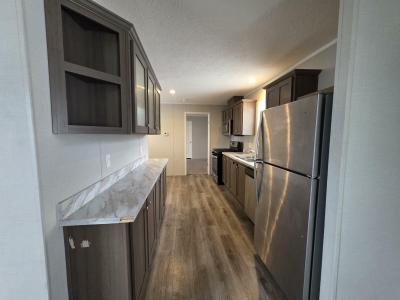 Photo 2 of 12 of home located at 1267 Avenue A #93 Springfield, MI 49037