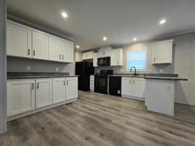 Photo 4 of 12 of home located at 7204 East Grand River Ave Lot 398 Portland, MI 48875