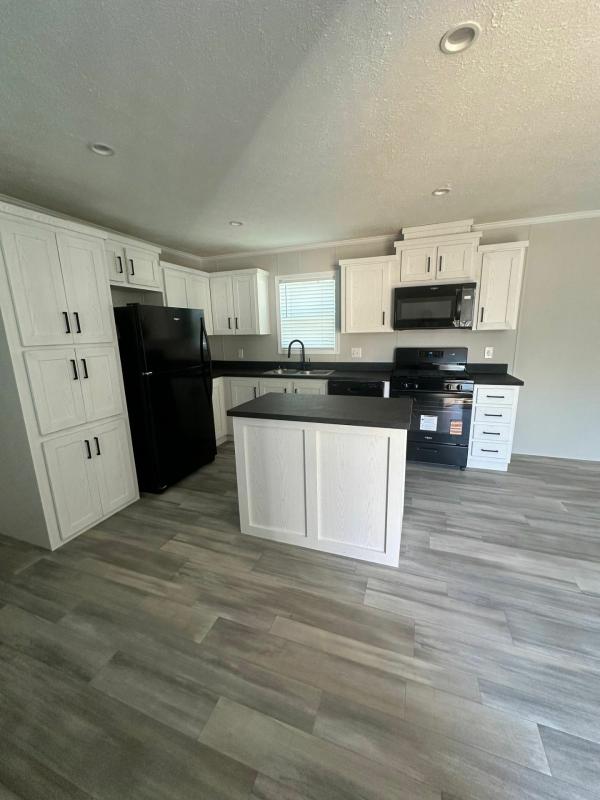 Photo 1 of 2 of home located at 13318 S. Dixie Hwy. # 159 Holly, MI 48442