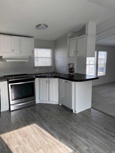 Photo 4 of 10 of home located at 43177 Ponchartrain Ave, #44 Sterling Estates, MI 48314