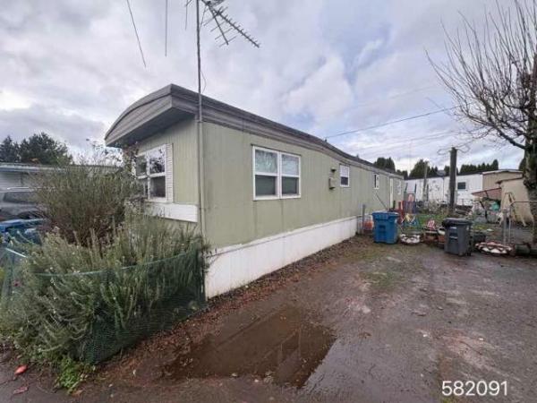 Photo 1 of 1 of home located at Olds Mobile Home Park 19798 Highway 99E Unit 22 Hubbard, OR 97032