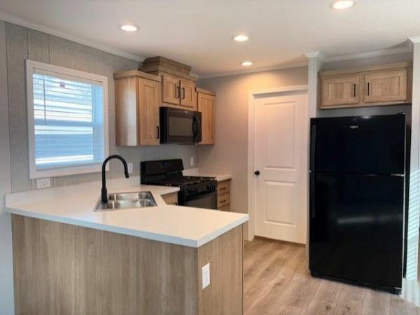 Photo 2 of 2 of home located at 68 Legrande West Howell, MI 48843