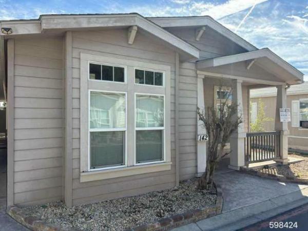 Photo 1 of 2 of home located at Lamplighter Ontario Mobile Park 2139 E 4th St Spc 142 Ontario, CA 91764