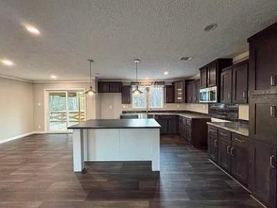 Photo 3 of 31 of home located at 601 Pine Ln Drummonds, TN 38023