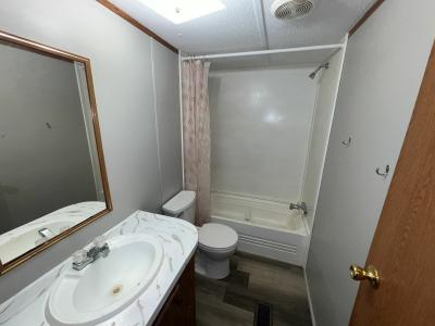 Photo 4 of 12 of home located at 1055 County Road 222 Blue Springs, MS 38828