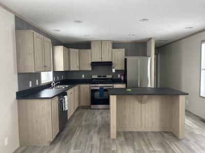 Photo 2 of 6 of home located at 223 South Lyon Woods South Lyon, MI 48178