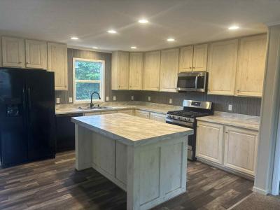 Photo 2 of 6 of home located at 6418 Lake Drive Site #006 Ypsilanti, MI 48197