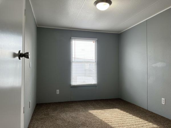 Photo 1 of 2 of home located at 1077 Oxford Court Lot #158 Greenville, TX 75401