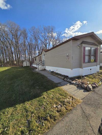 Photo 2 of 10 of home located at 64 Aspen Dr Wixom, MI 48393