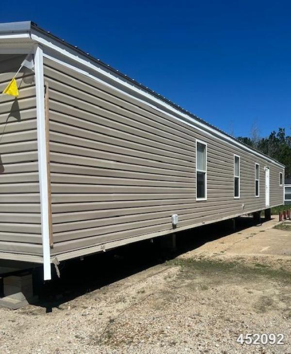 Photo 1 of 2 of home located at Milford Enterprise Inc. 8652 Us Highway 96 N Brookeland, TX 75931