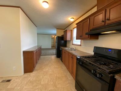 Photo 4 of 9 of home located at 4112 Cherry Brook Burton, MI 48519