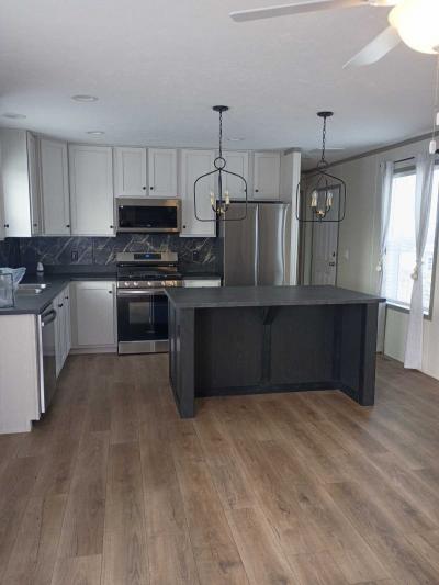 Photo 3 of 8 of home located at 5289 Americana Ln. Casco, MI 48064